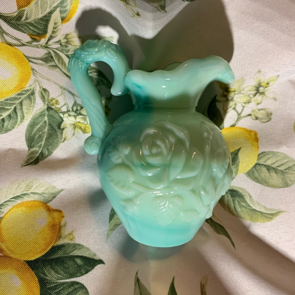 Avon blue green pitcher